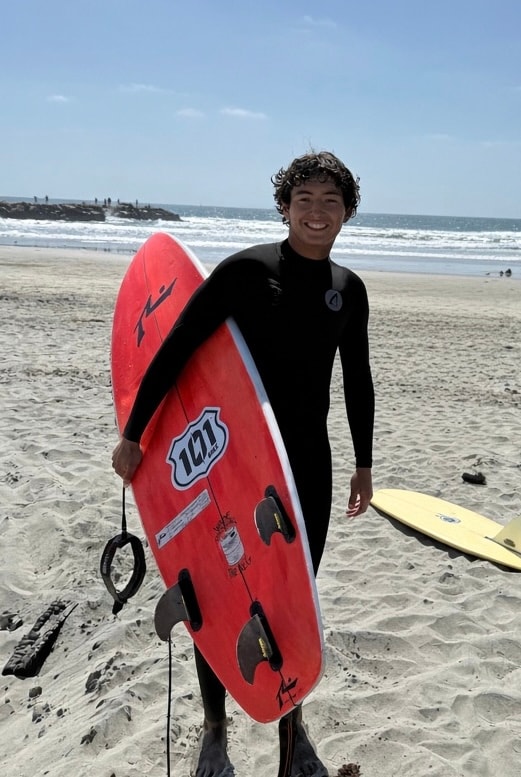 Nate Shinn, founder of Surf Strong Academy, on a Carlsbad beach